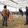 Faculty and student researchers at Ambler campus research solar array.